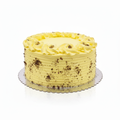 Authentic Rasmalai Eggless Cake with rose-petal frosting rosettes and chocolate crumb specks.